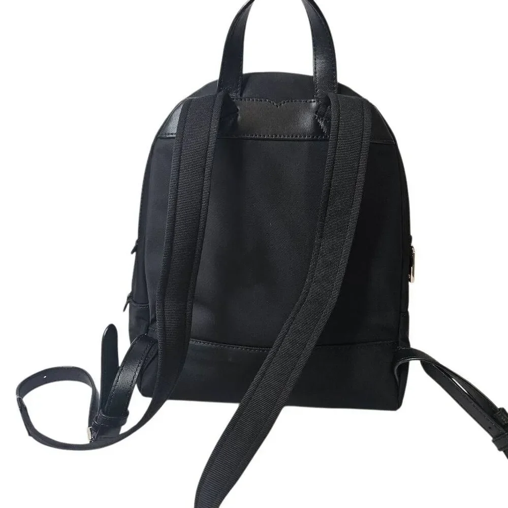 Kate Spade Karissa black nylon backpack, minimalist design.